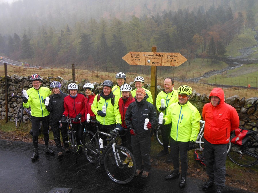 Chief Executive of Lake District National Park, Richard Leafe (foreground) with British Cycling ride leaders who cycled over from Thirlmere and Grasmere to meet at the summit of the new Dunmail Raise multi-user trail.