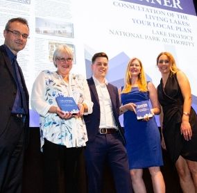 Planning Editor Richard Garlick with the Lake District National Park’s Paula Allan, Rob Allison, Laura Ross and Hanna Latty  with the two planning awards 