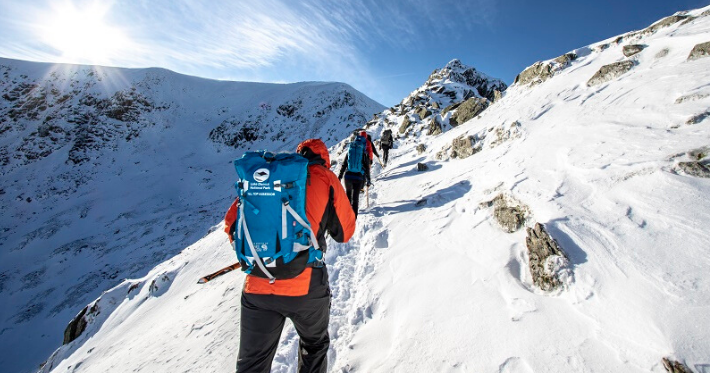 Fell Top Assessors climbing up Helvellyn.