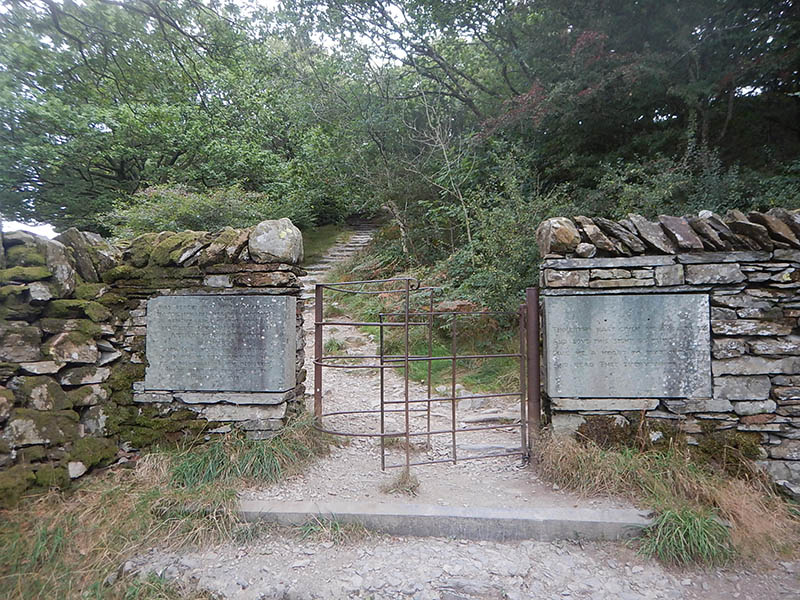 The path passes a Victorian kissing gate.