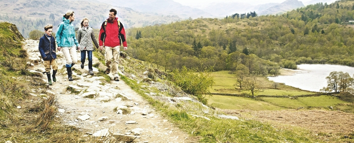 Family walking on a footpath in the Lake District