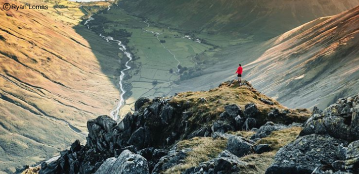 A visitor walking up Great Gable