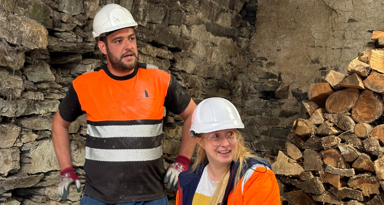 Amy Redman, Crosby Granger Architects, hand dressing Westmorland slate with Ben Dyson from DEC Construction Ltd. Credit Jen Langfield, SPAB Scholar 2024.