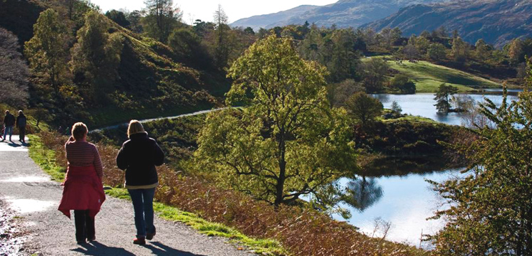 Walkers enjoying views from Tarn Hows copyright Charlie Hedley