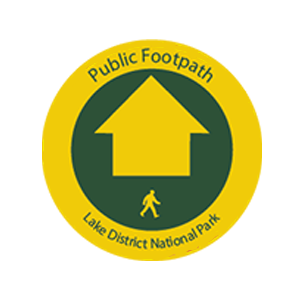 Yellow arrow sign - public footpath right of way sign