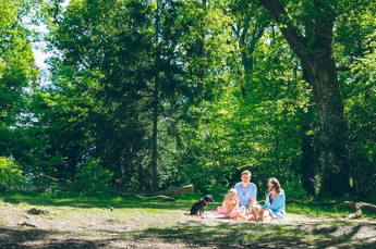 Family enjoying a picnic in the Brockhole On Windermere gardens