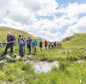 a guided walk group exploring Legburthwaite in the Lake District last summer.