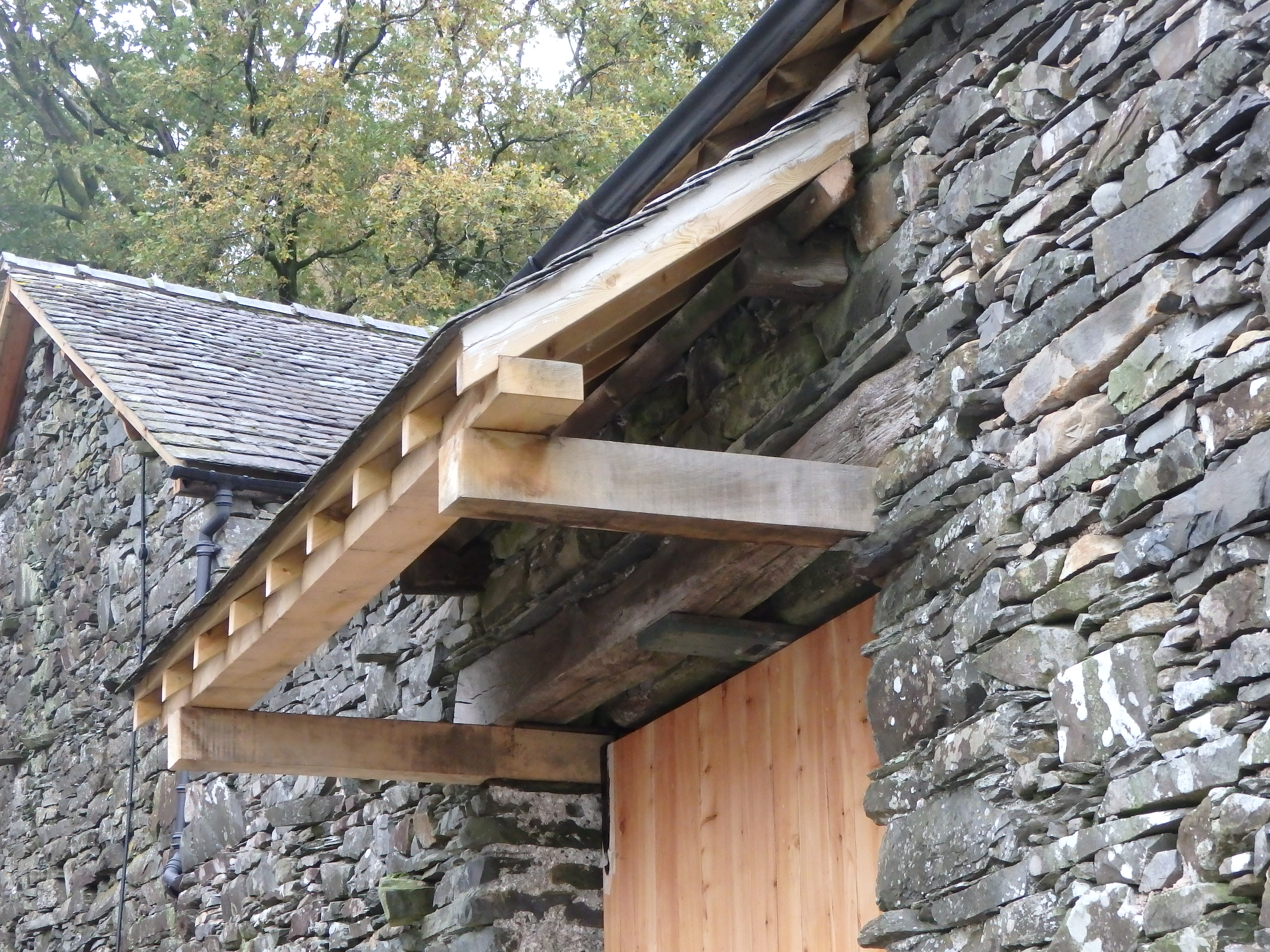 Larch repairs to pentice porch at Bank End Farm