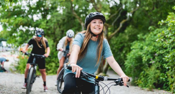 Girl cycling on a bike