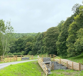 This photo shows the new stretch of path with underpass for farming use. 