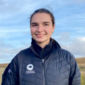headshot of Jasmine Holliday in LDNPA branded jacket against blue sky