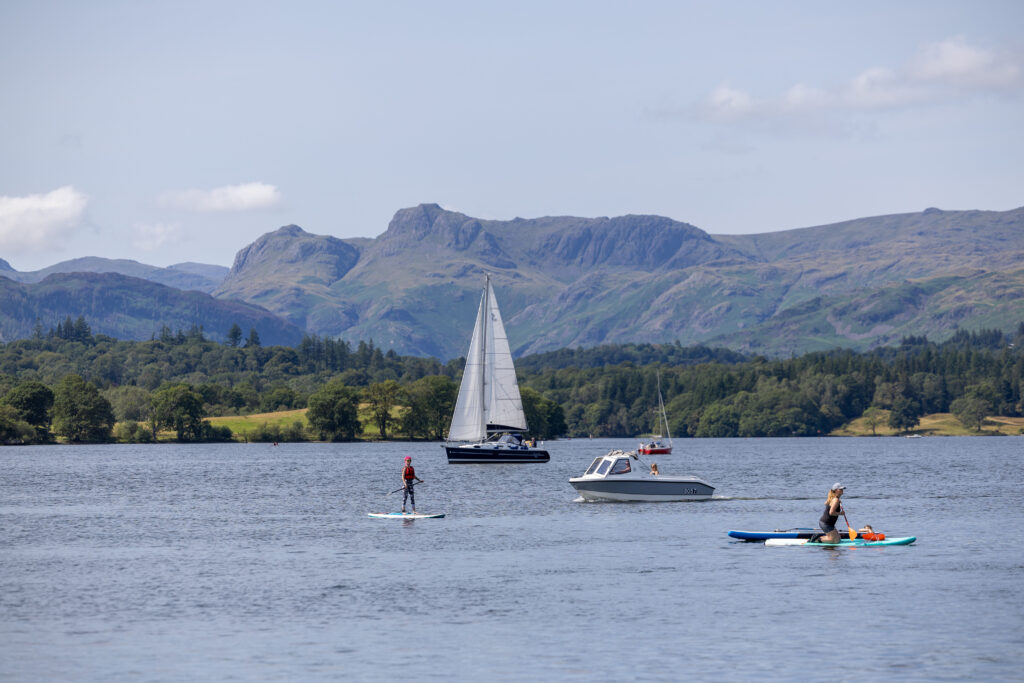 Windermere Lake with Langdales in background and boats on the water