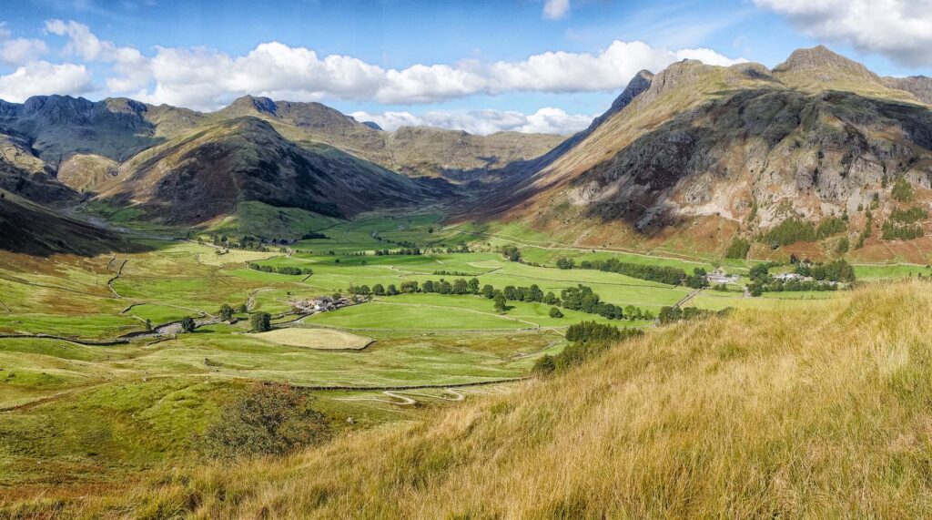 Looking down over the Langdale valley with shadows casting over the mighty Langdale fells