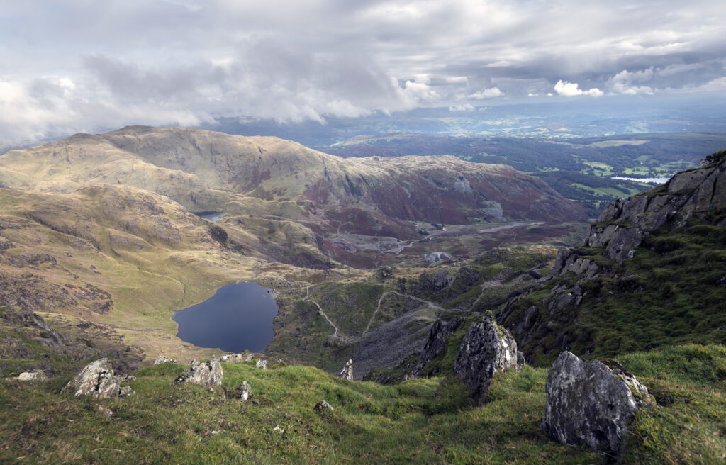View over Seathwaite tarn, Coniston with rocks at the top