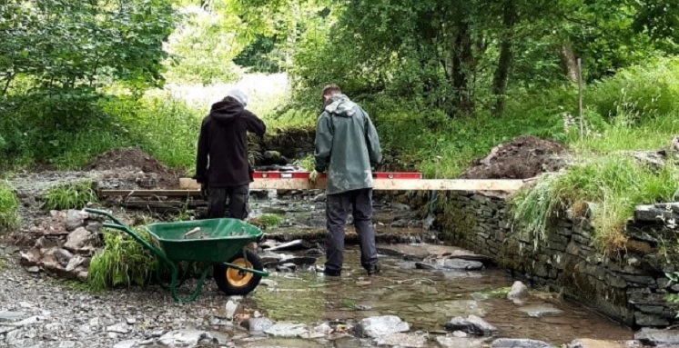 Jed Porter and Finn Laverack levelling a bridge.