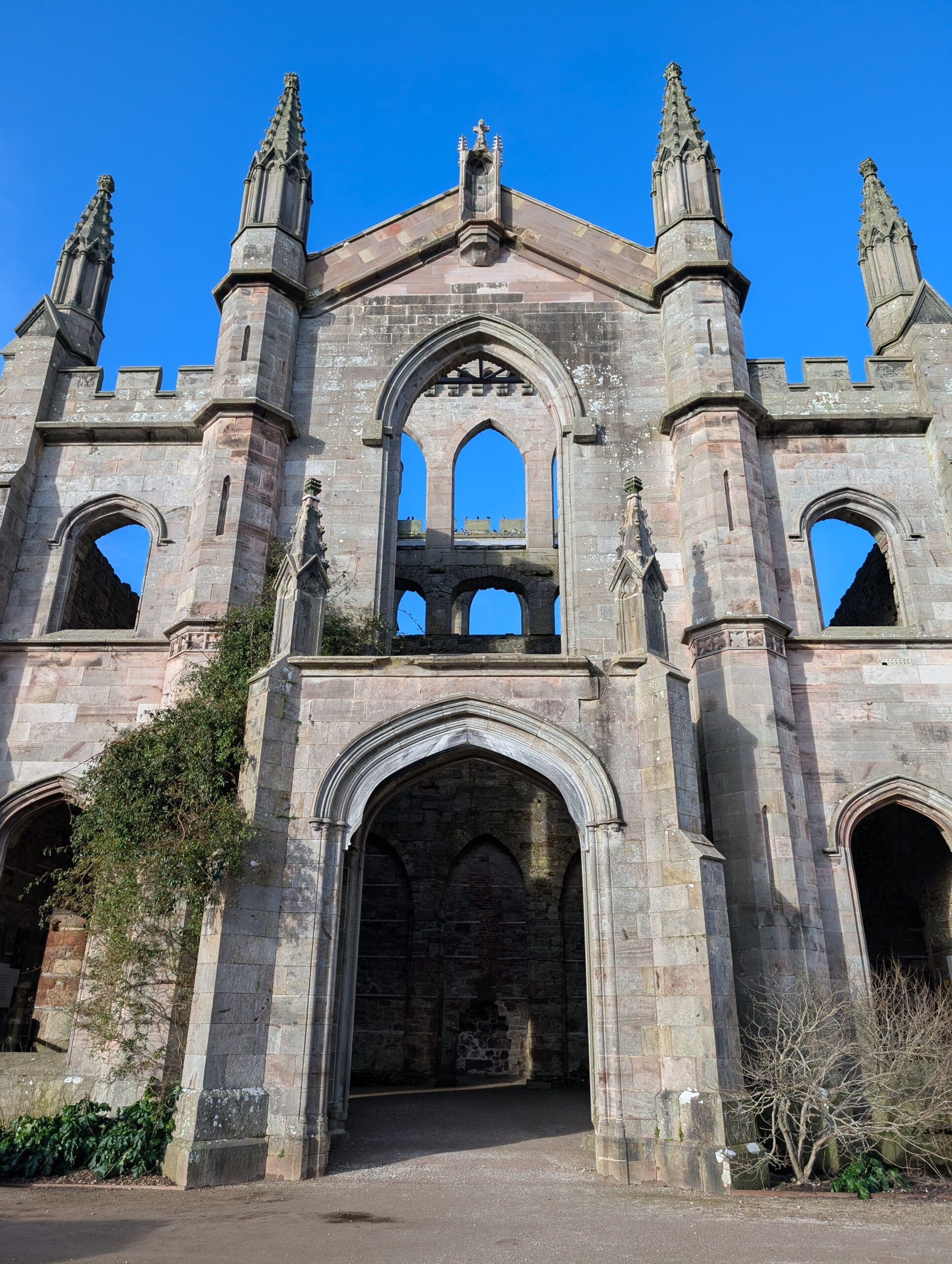 Lowther Castle grand frontage with turrets either side