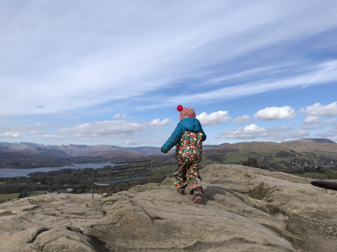 young girl at top of Orrest Head