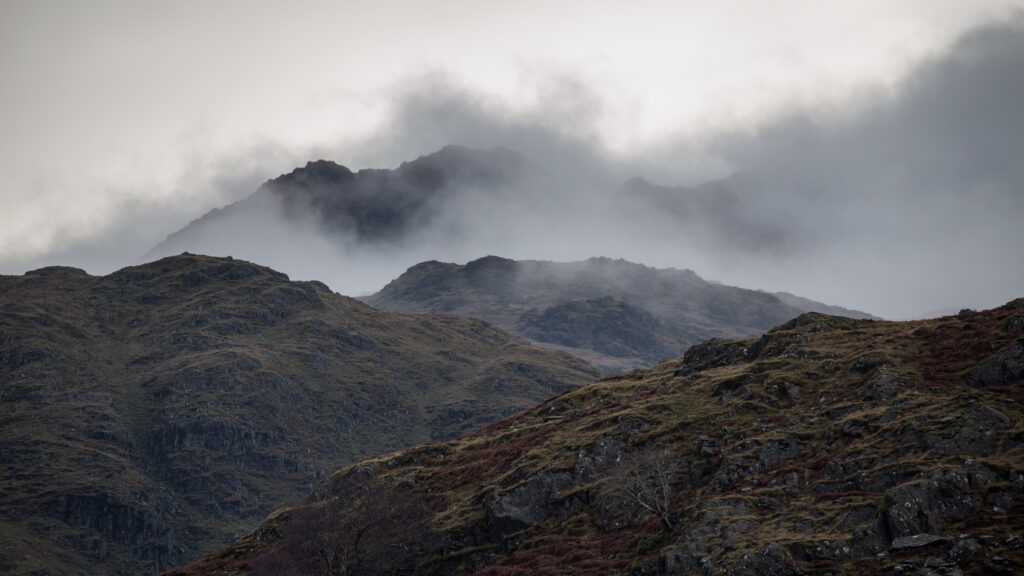 Misty, rocky fell tops