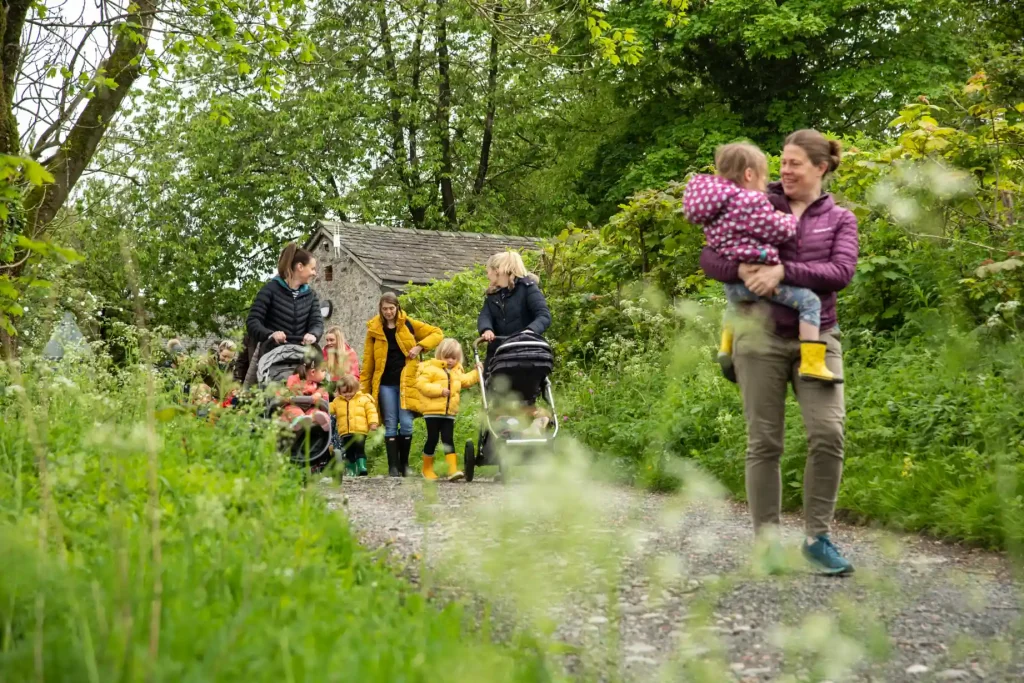 woman with push chairs and toddlers on the Sizergh farm trail
