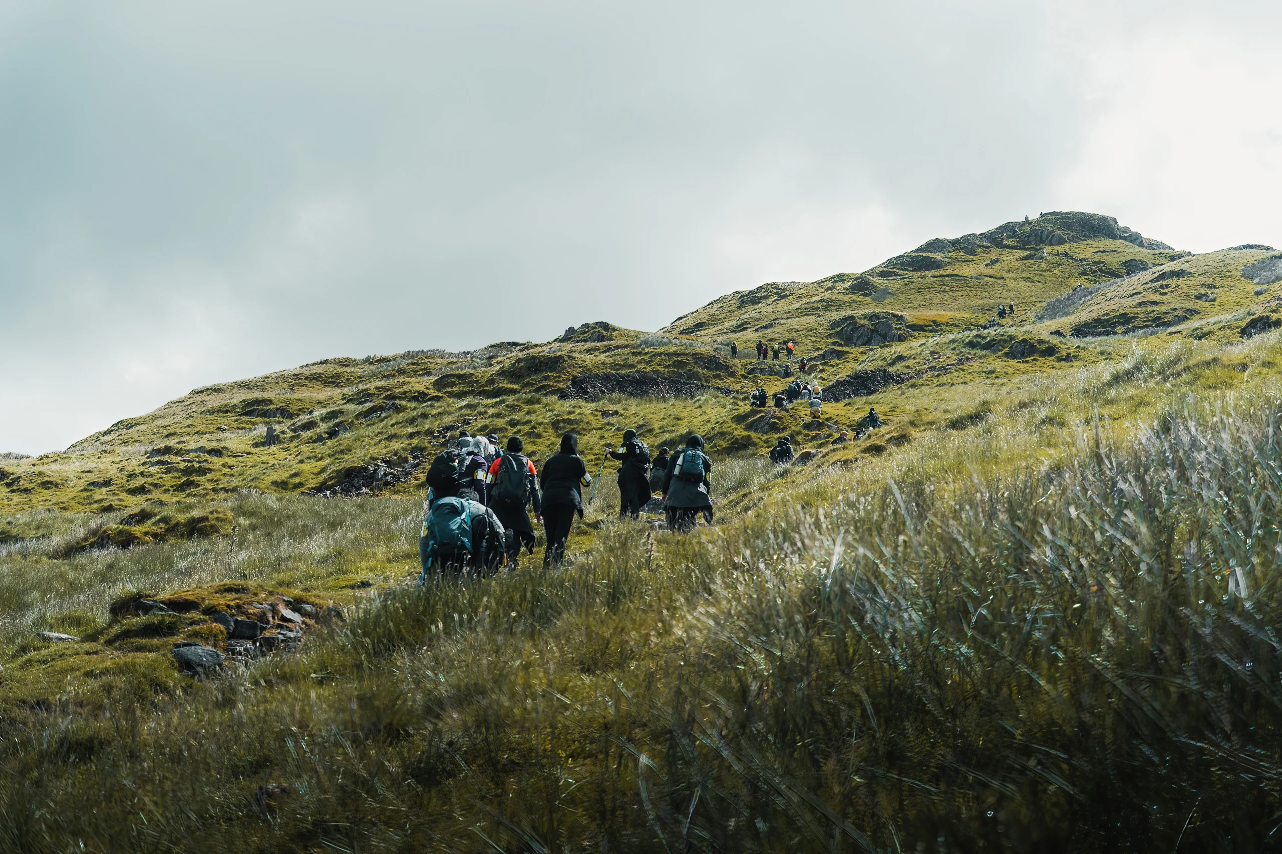 group of hikers on a fell top